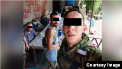 Украинада согушка катышкан деген негизде соттолгон адам. УКМК тараткан сүрөт. 12-январь, 2023-жыл.
