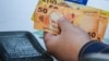 KYRGYZSTAN -- Tulpar card - som. Kyrgyz currency. Money. Cash and non-cash. National currency. Cashless payment, cashless payments, bank card, QR code payment,
