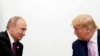 Дональд Трамп и Владимир Путин во время саммита «Группы двадцати» в японской Осаке в 2019 году