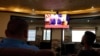 A television screen shows U.S. President Donald Trump as Palestinians follow the news on UAE 's agreement with Israel on normalising relations, in Hebron in the Israeli-occupied West Bank August 13, 2020.