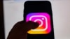 This picture taken in Istanbul on August 2, 2024, shows the logo of the social network Instagram on a smartphone.